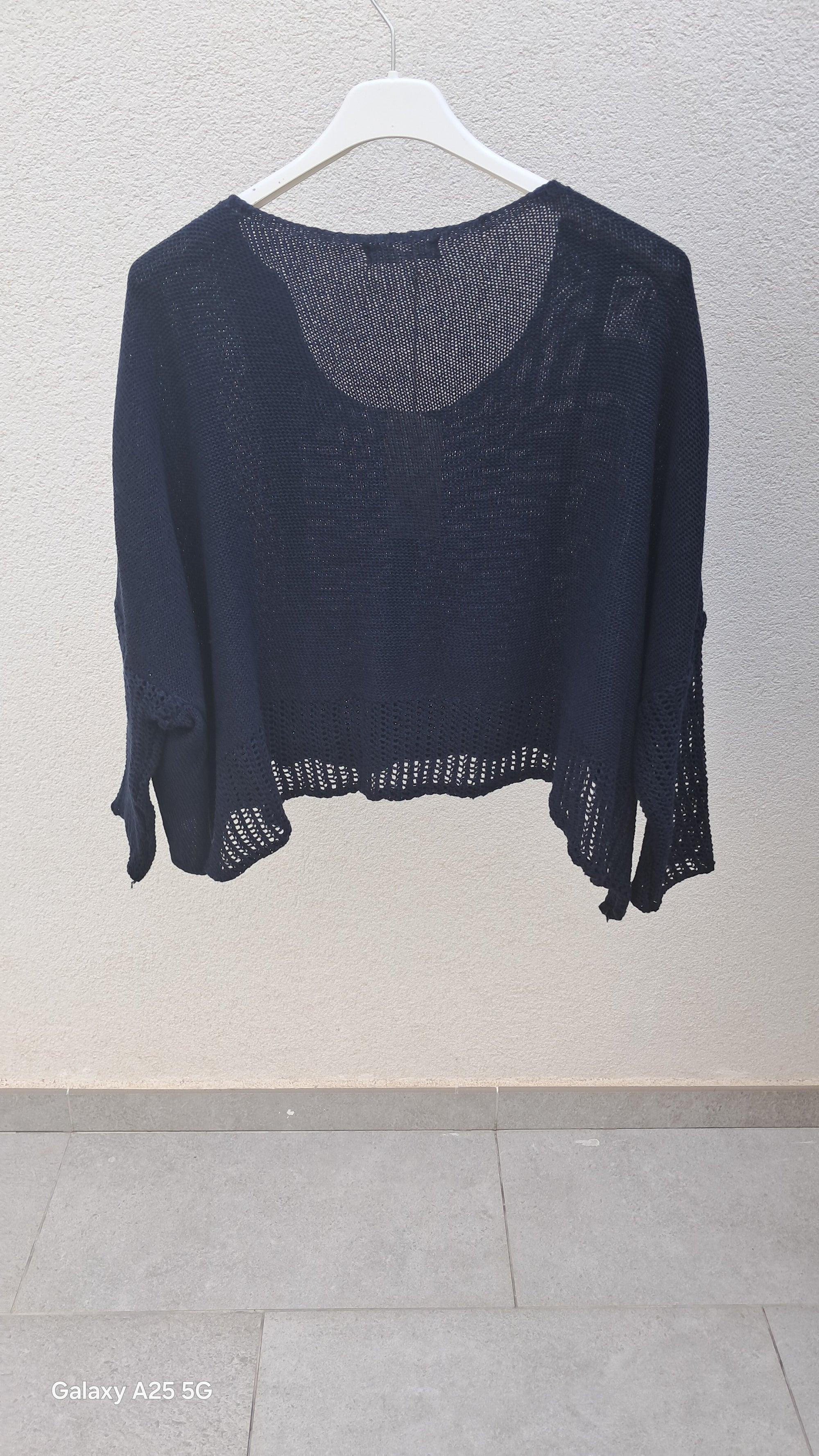 Jersey sobre camisa.