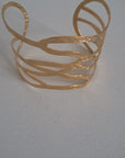 Brazalete de color oro