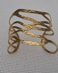 Brazalete de color oro