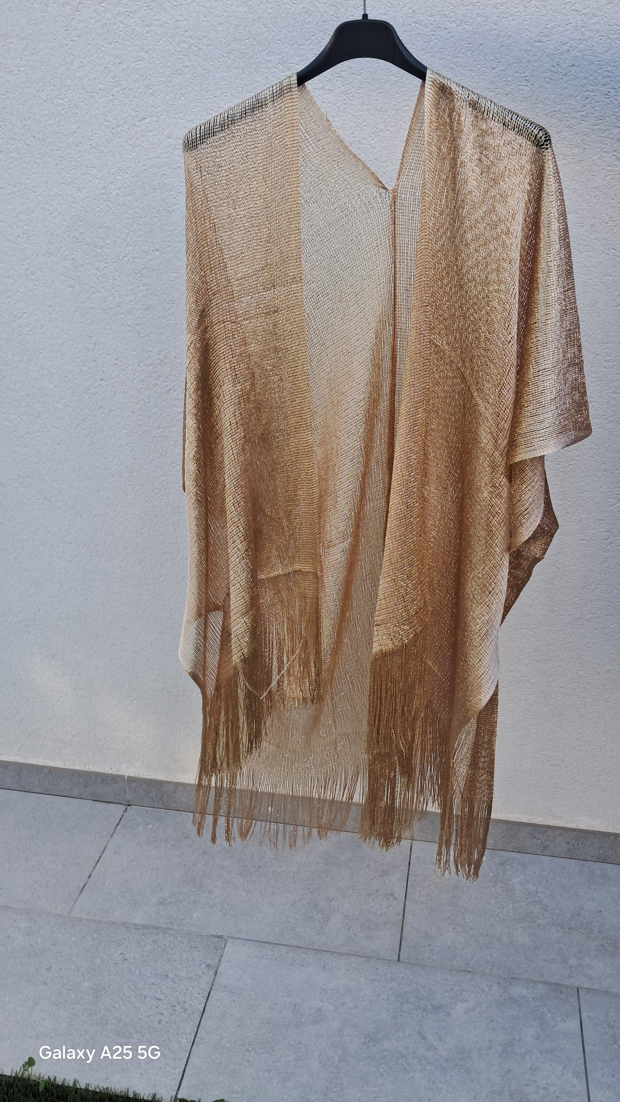 Ponchos de color plata y color oro