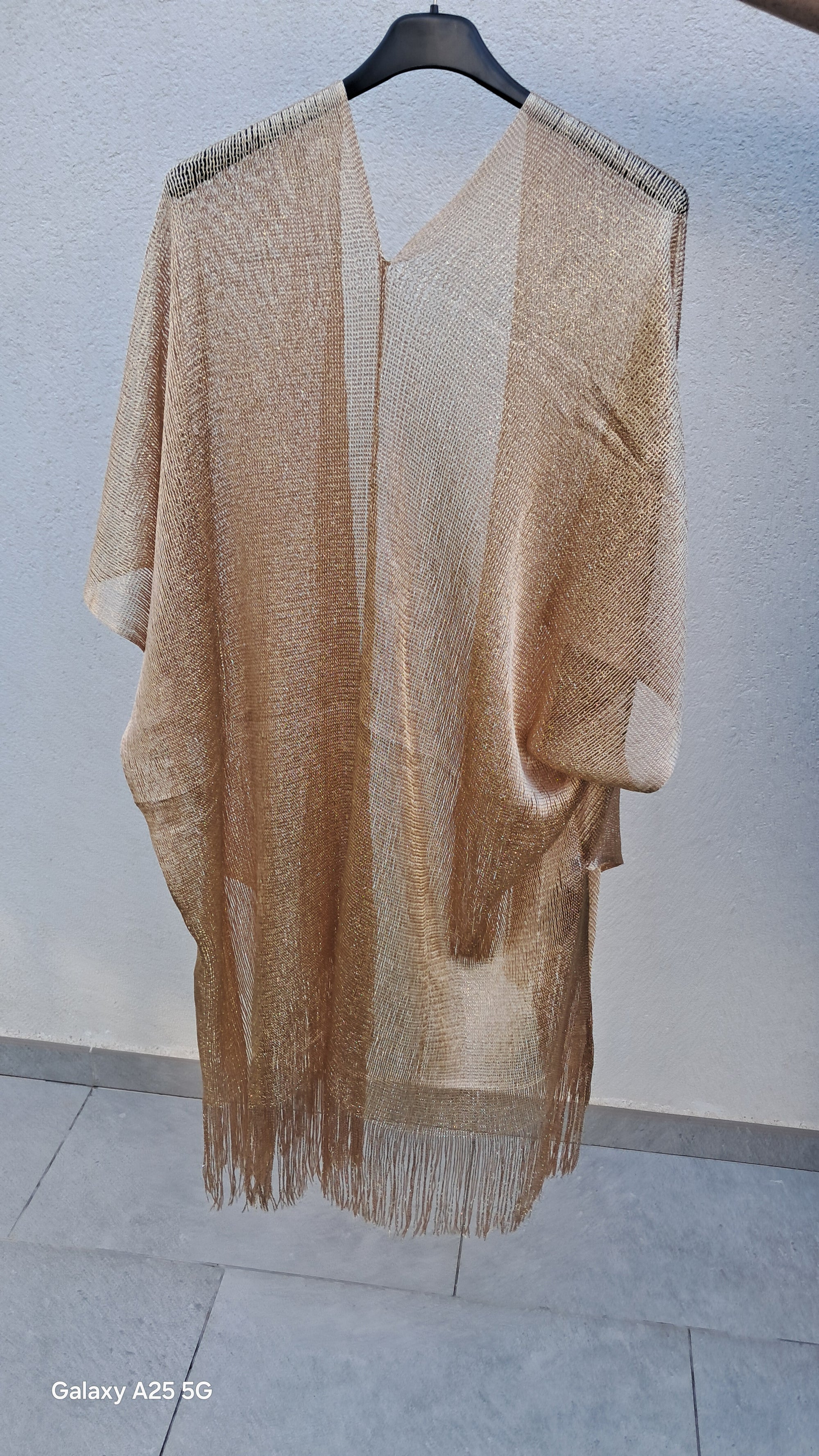 Ponchos de color plata y color oro